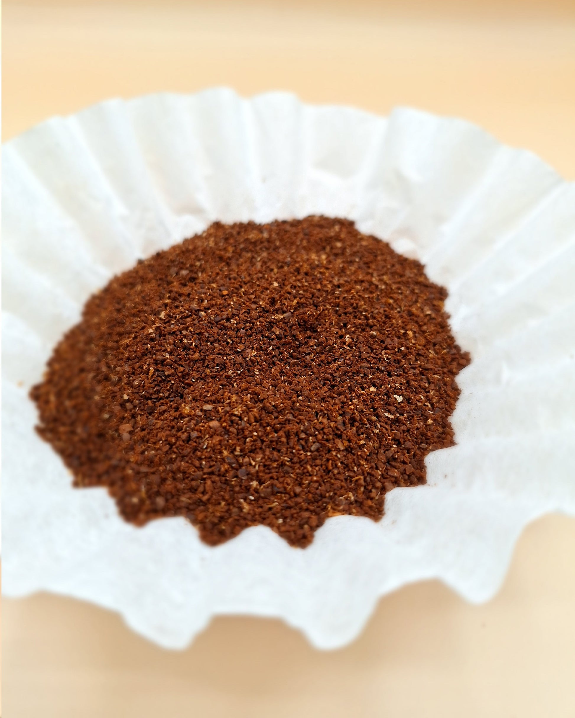 Single-origin light roast coffee grounds, sourced from Ethiopia.